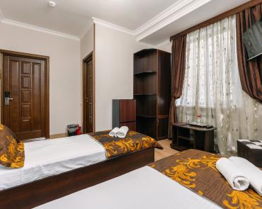 Номера стандарт с двумя отдельными кроватями